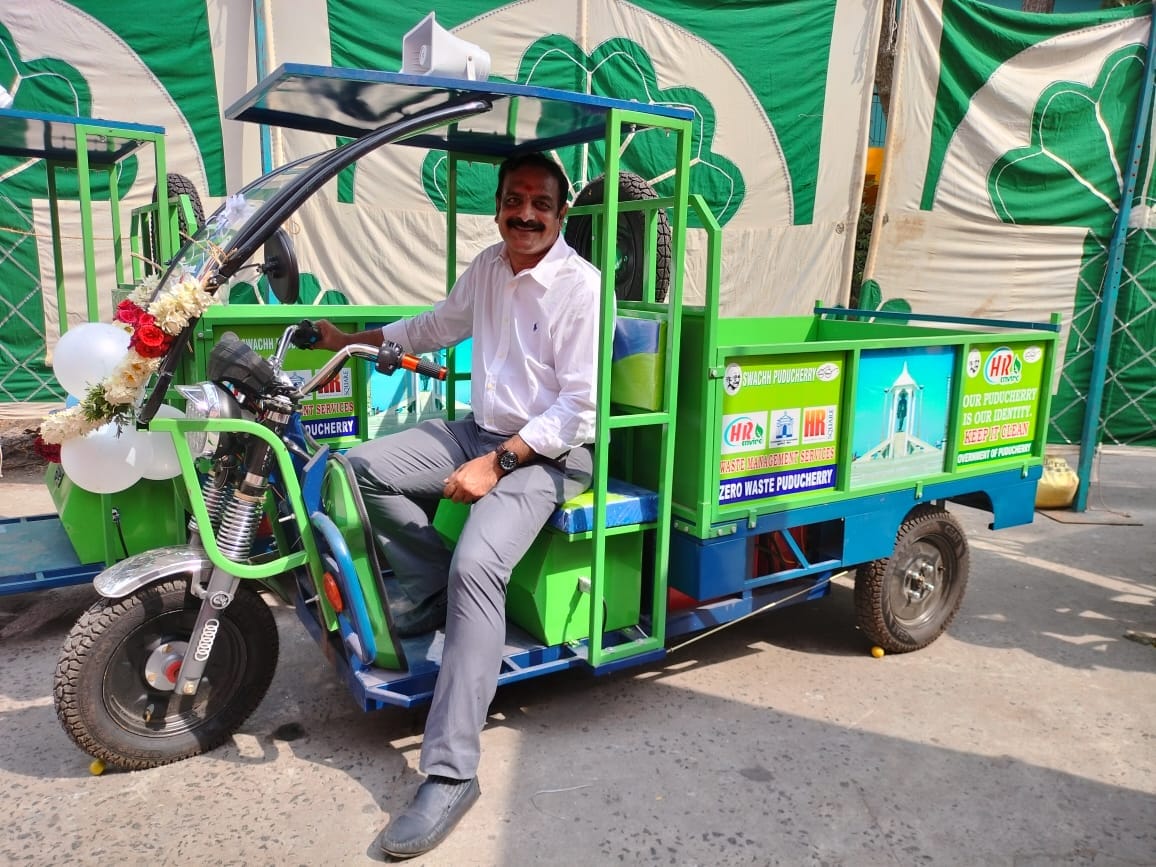 Managing Director with Swachh Puducherry electric collection vehicle
