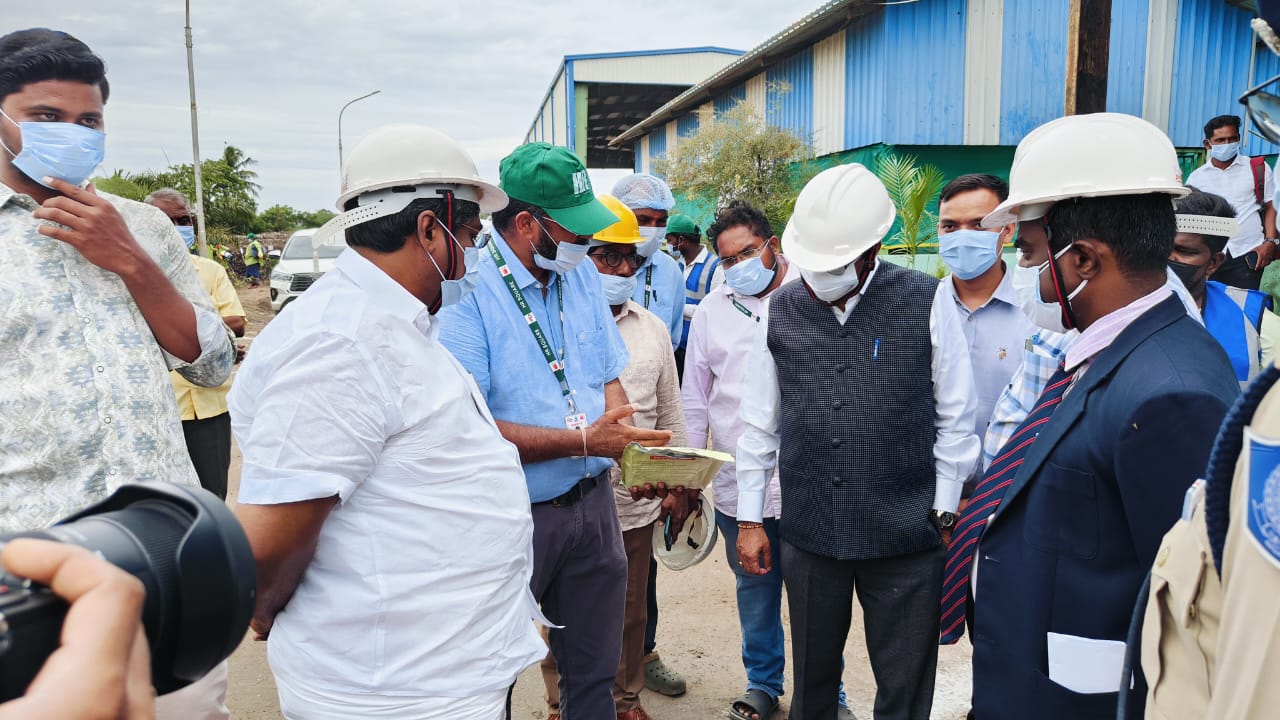 Site walkthrough with officials at processing facility